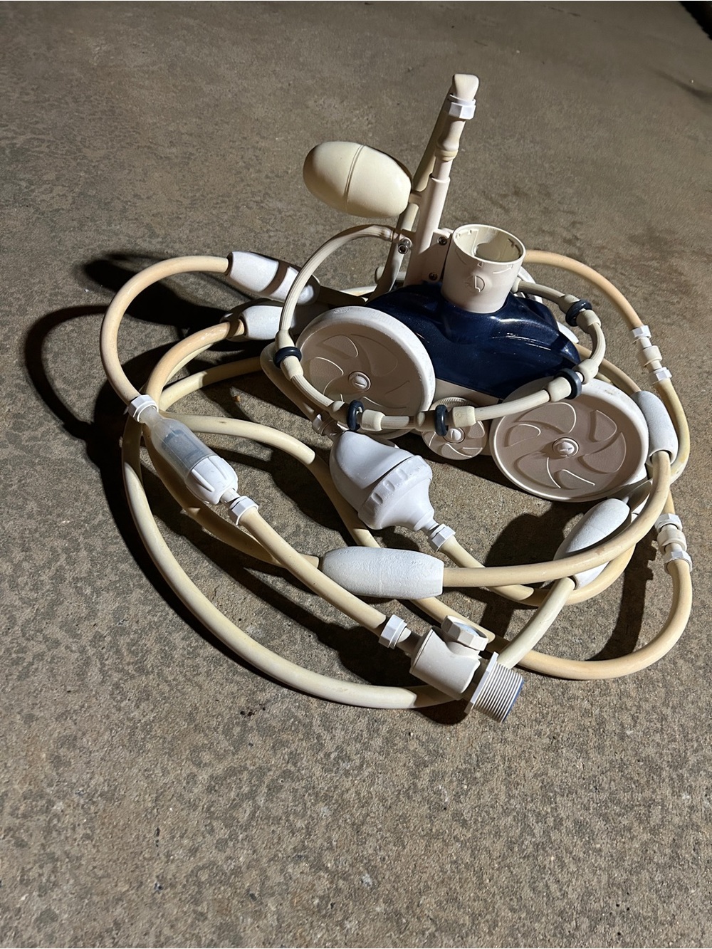 White and Blue Pool Polaris Cleaner with Hoses